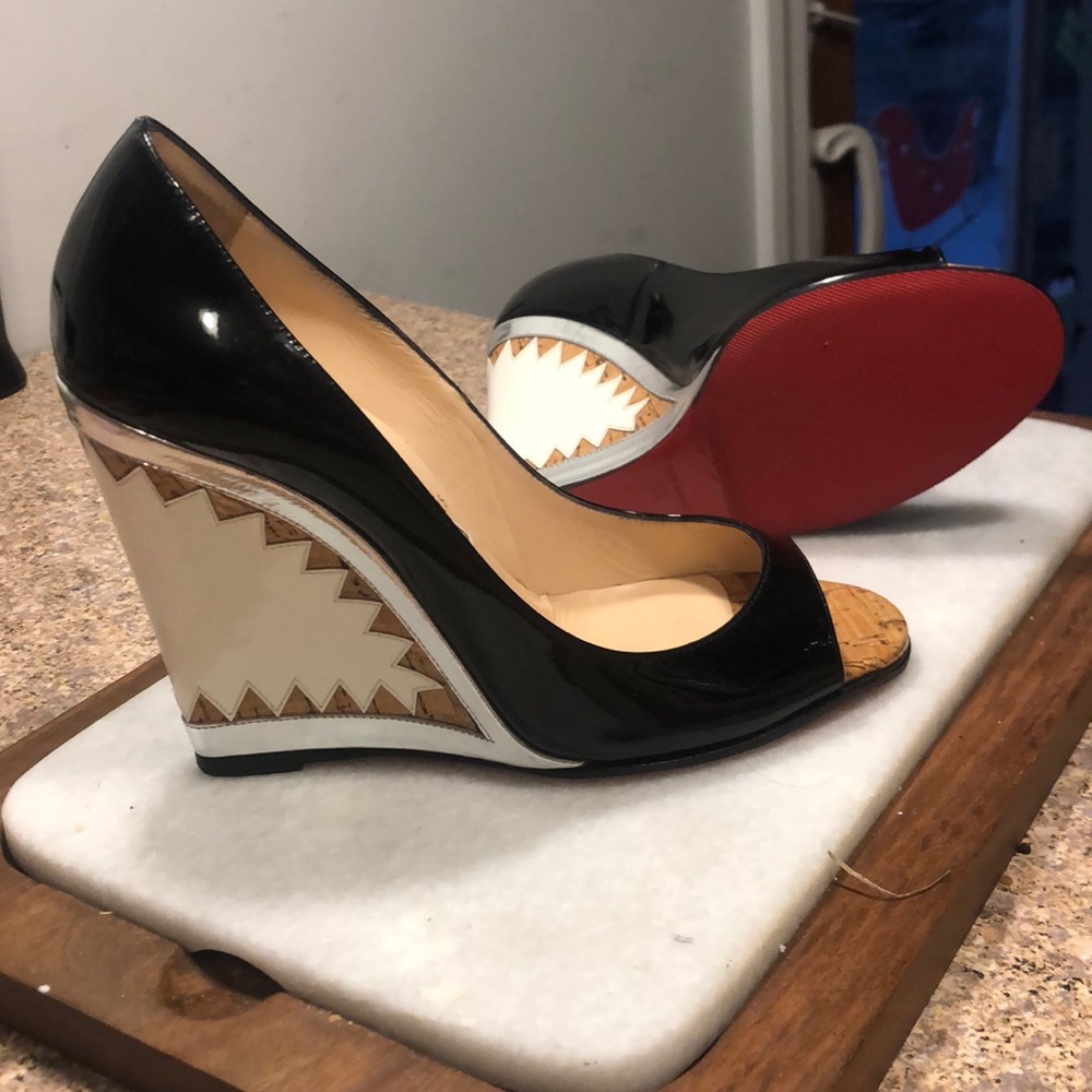 Christian Louboutin Shark Wedge Red Bottom Heels.